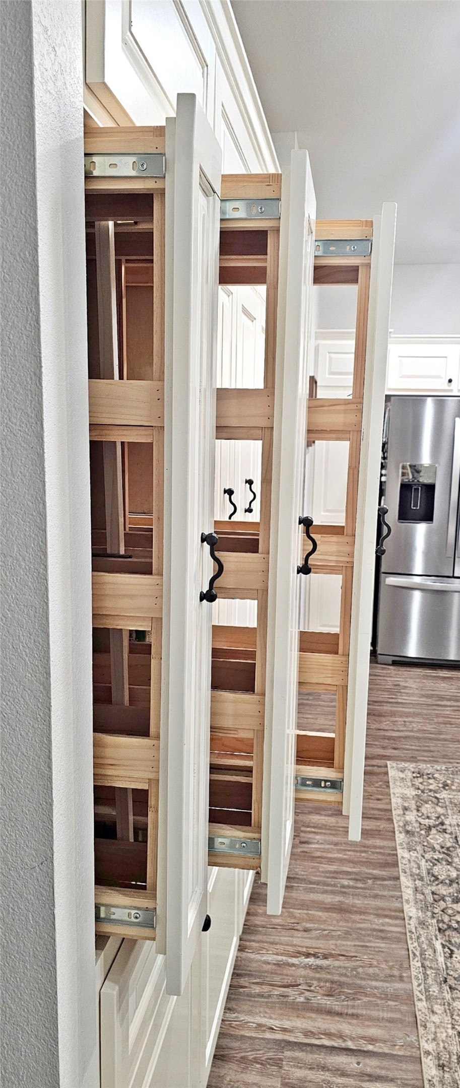 201 Smith Street Columbus, TX 78934 - Photo 10 of 20 a view of a hallway with wooden floor and entryway