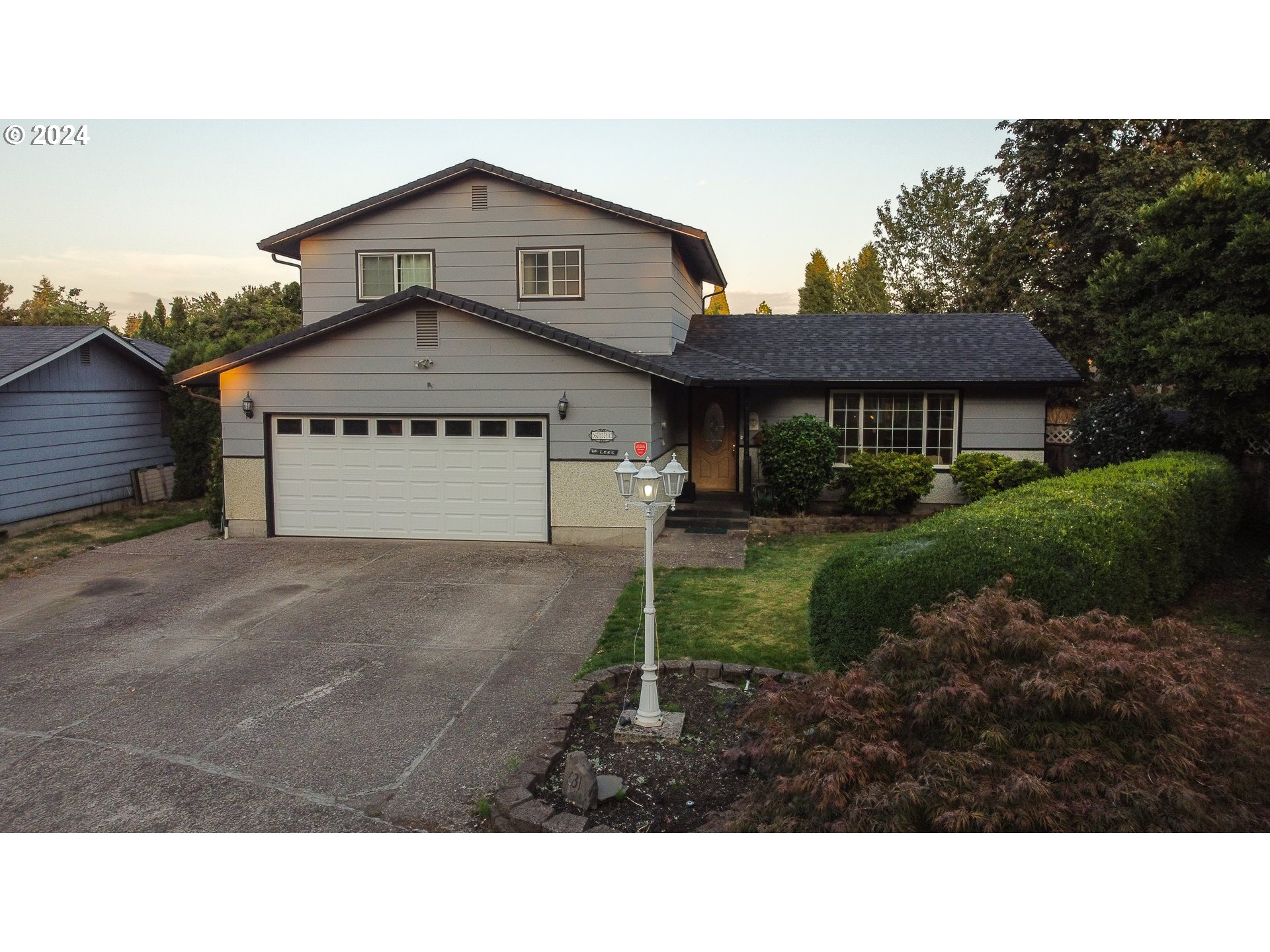 631 Rayner Avenue Springfield, OR 97477 - Photo 2 of 40 a black and white house with a yard