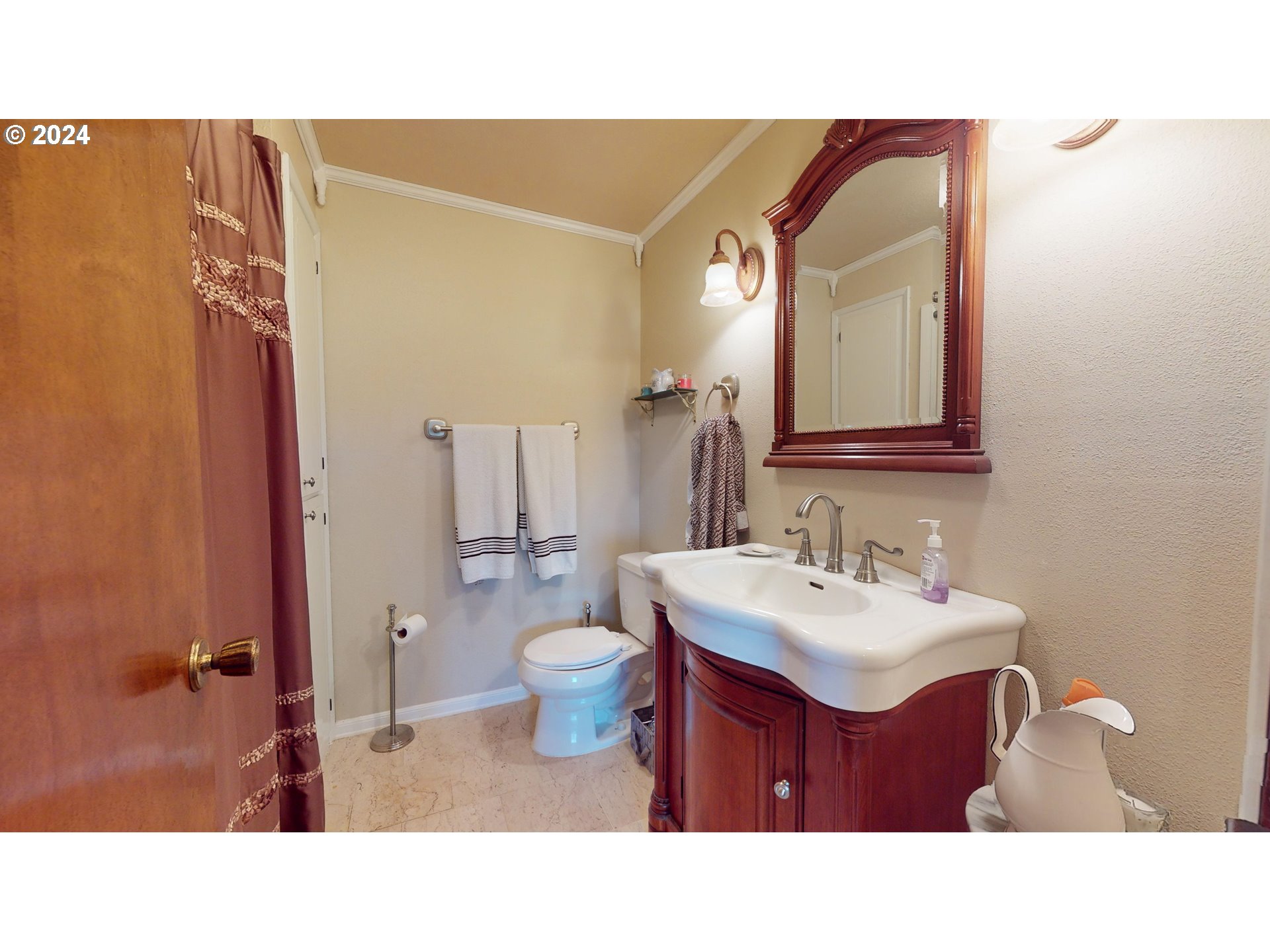 631 Rayner Avenue Springfield, OR 97477 - Photo 26 of 40 a bathroom with a sink vanity mirror and toilet