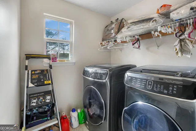a view of a backyard with sitting area