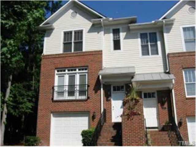 6101 Bordesley Court Raleigh, NC 27609 - Photo 1 of 6 a front view of a house