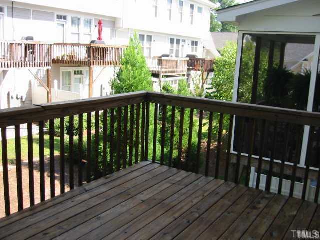 6101 Bordesley Court Raleigh, NC 27609 - Photo 6 of 6 a view of a balcony with wooden floor