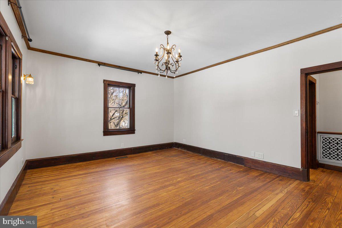 23320 Watson Road Leesburg, VA 20175 - Photo 13 of 51 a view of an empty room with wooden floor