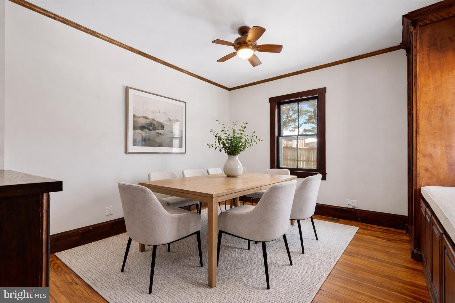 23320 Watson Road Leesburg, VA 20175 - Photo 18 of 51 a view of a dining room with furniture and wooden floor