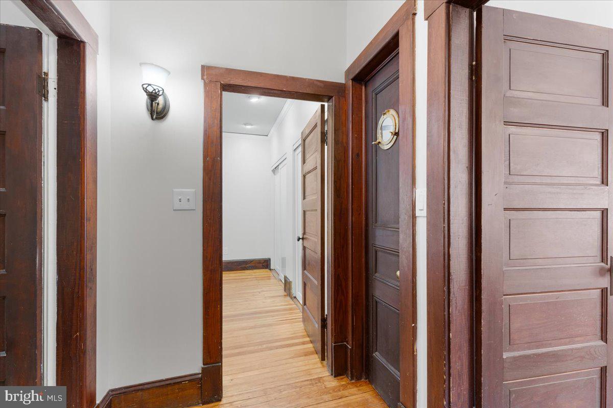 23320 Watson Road Leesburg, VA 20175 - Photo 23 of 48 a view of a bathroom from a hallway