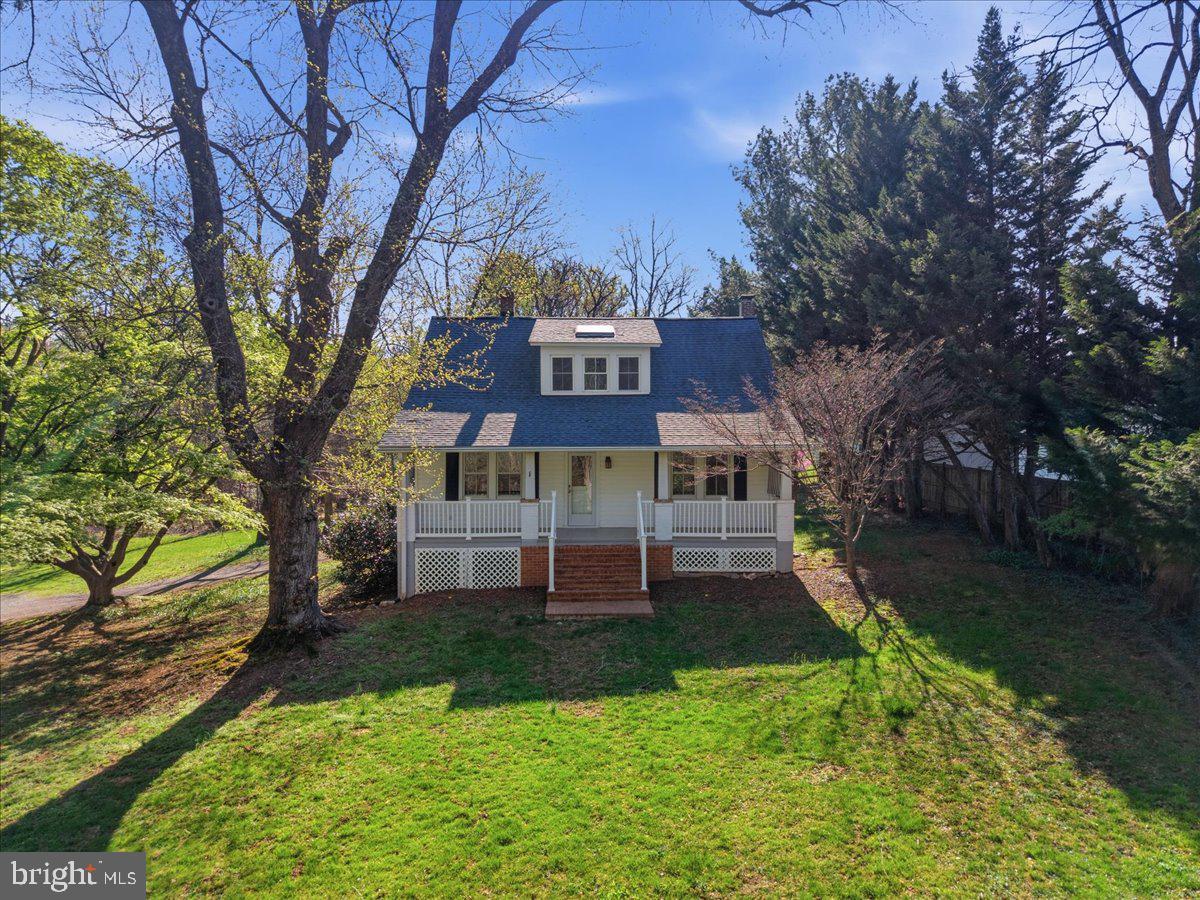 23320 Watson Road Leesburg, VA 20175 - Photo 30 of 48 a view of a house with a big yard