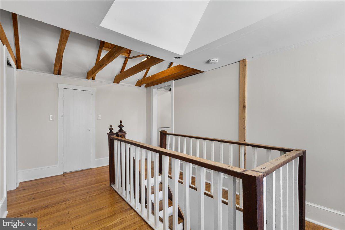 23320 Watson Road Leesburg, VA 20175 - Photo 31 of 51 a view of staircase with railing and white walls