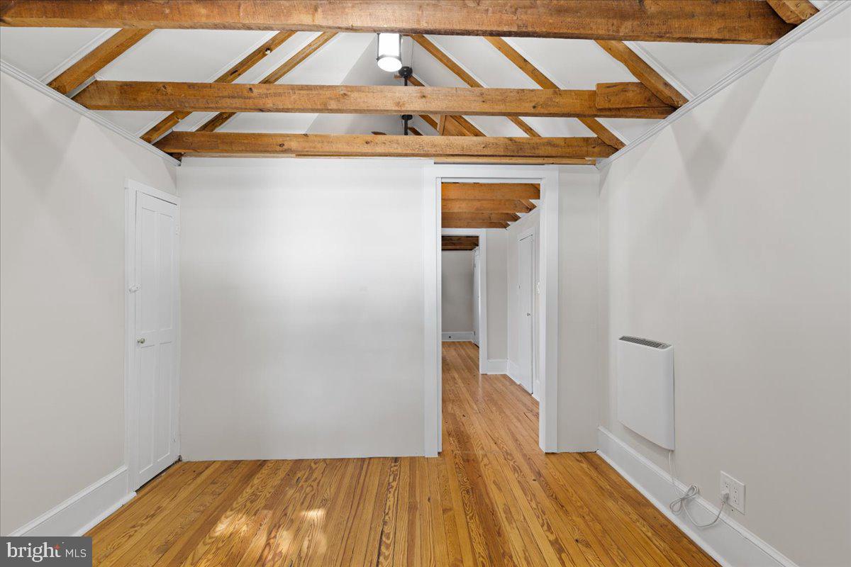 23320 Watson Road Leesburg, VA 20175 - Photo 32 of 51 a view of a room with wooden floor and a ceiling fan