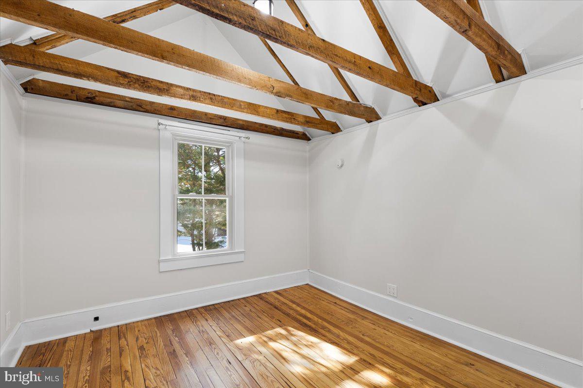 23320 Watson Road Leesburg, VA 20175 - Photo 35 of 48 a view of an empty room with wooden floor and a window