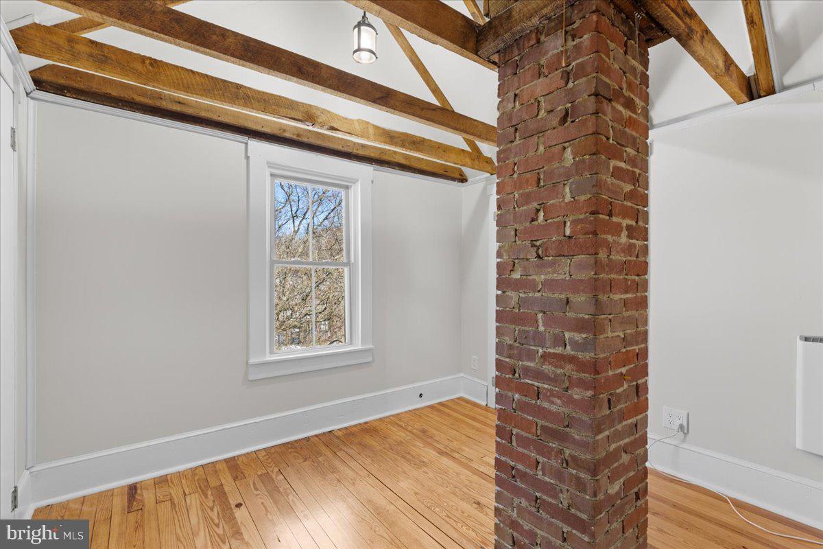 23320 Watson Road Leesburg, VA 20175 - Photo 36 of 48 bedroom w/ exposed beams and brick details