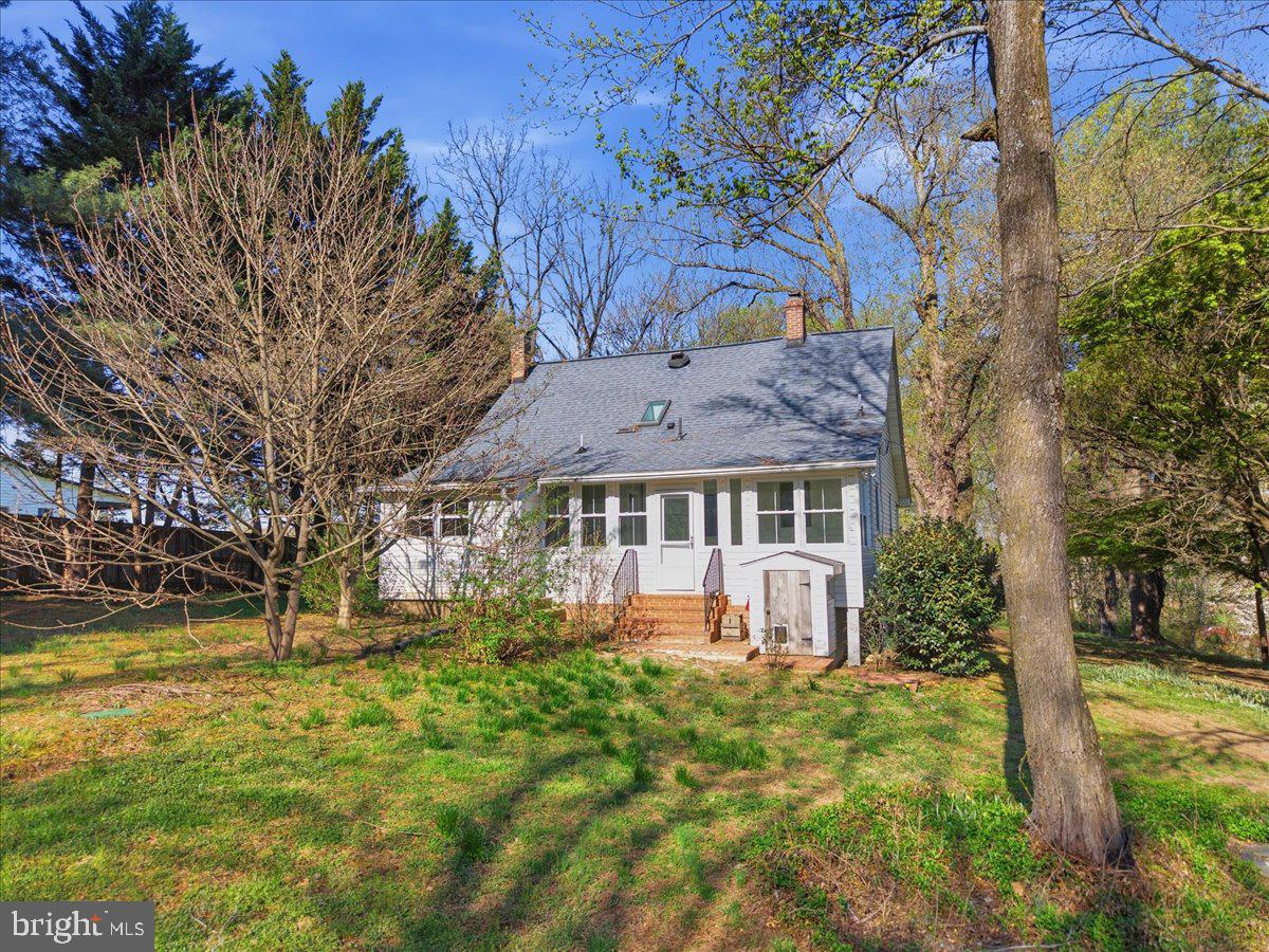 23320 Watson Road Leesburg, VA 20175 - Photo 44 of 48 a front view of a house with a yard