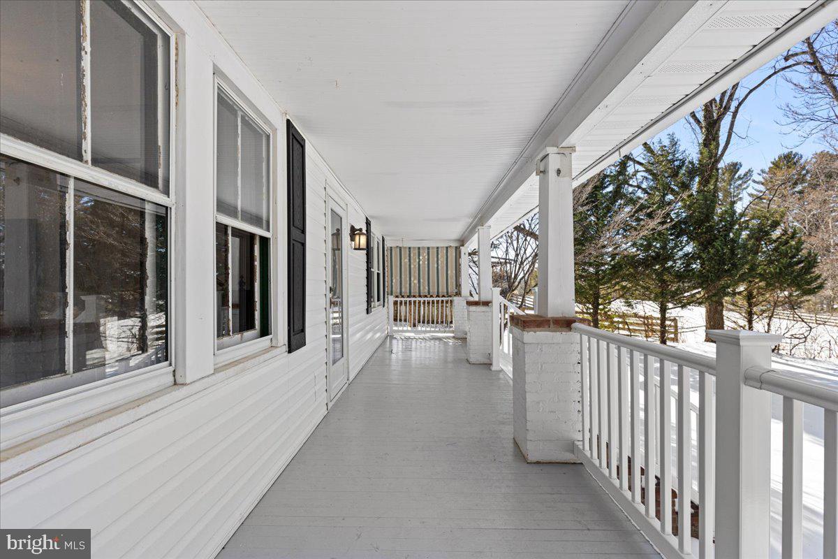 23320 Watson Road Leesburg, VA 20175 - Photo 44 of 51 a view of a house with a porch