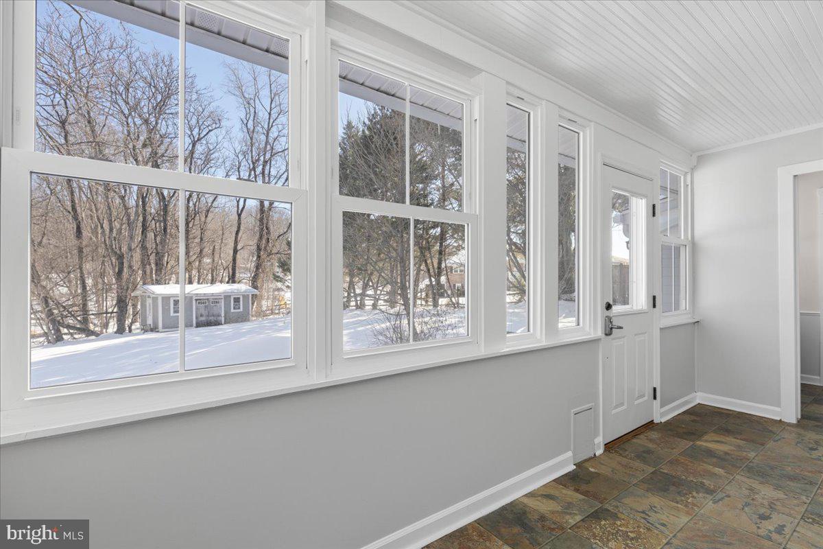 23320 Watson Road Leesburg, VA 20175 - Photo 5 of 48 a view of an empty room with a window