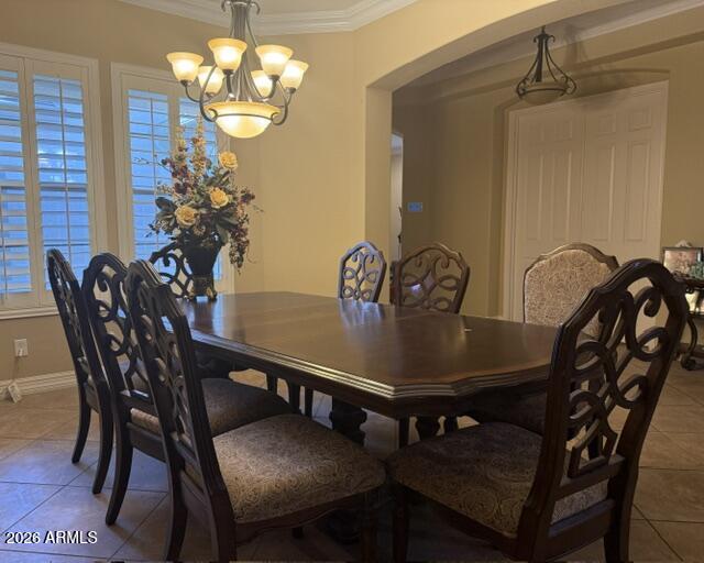 16121 West Berkeley Road Goodyear, AZ 85395 - Photo 9 of 20 a view of a dining room with furniture and chandelier