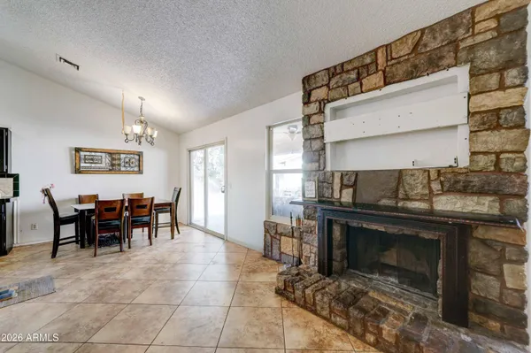 a bedroom with bed and flat screen tv