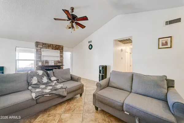 a kitchen with a stove and a table