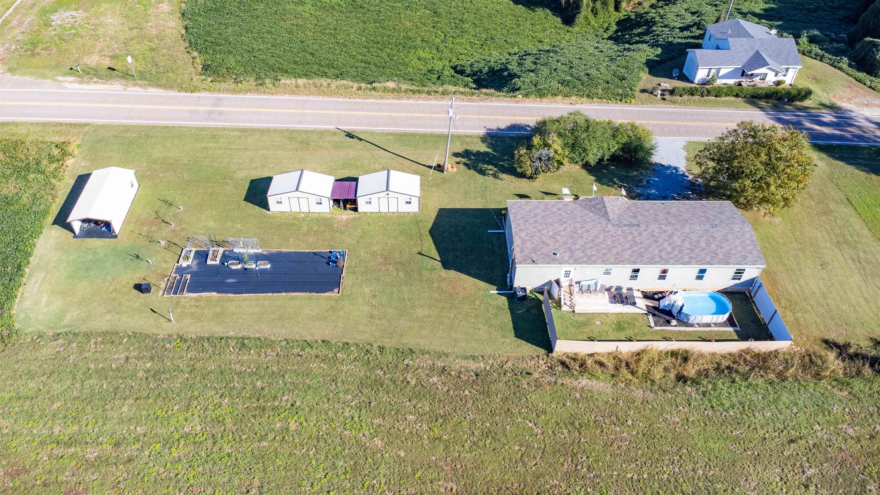 6483 Hwy 19 Highway West Ripley, TN 38063 - Photo 32 of 33 an aerial view of residential houses with outdoor space