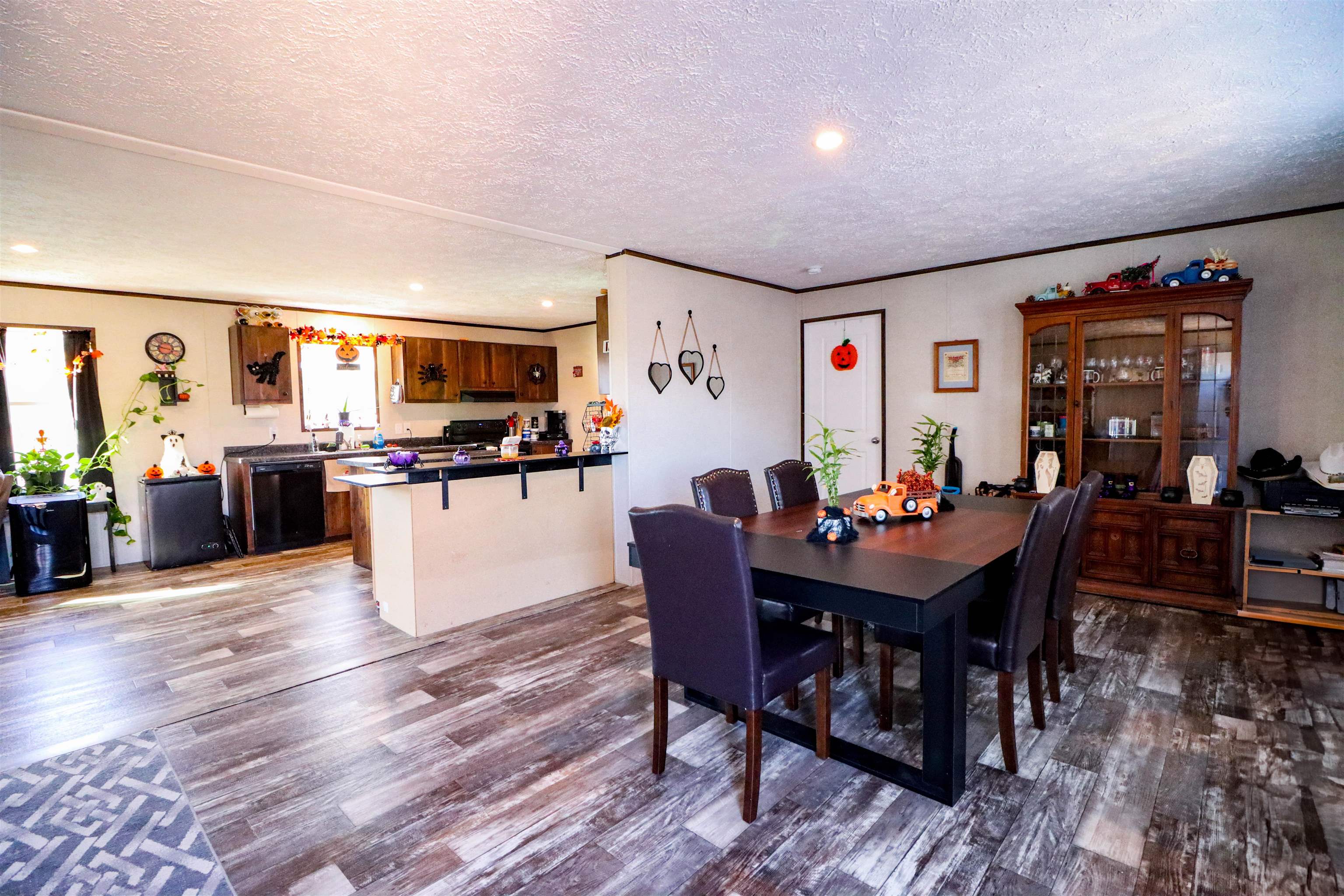 6483 Hwy 19 Highway West Ripley, TN 38063 - Photo 4 of 33 a view of a dining room with furniture and wooden floor