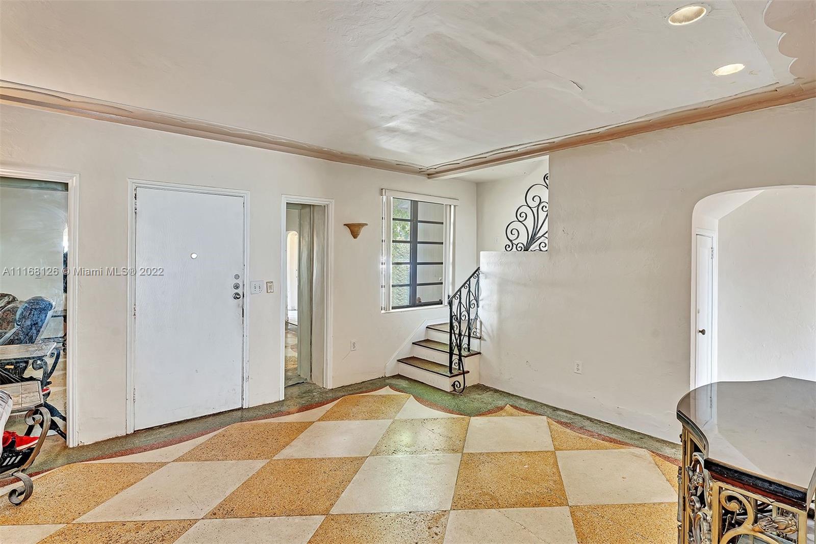 2033 North Bay Road Miami Beach, FL 33140 - Photo 3 of 38 a view of a room with gym equipment