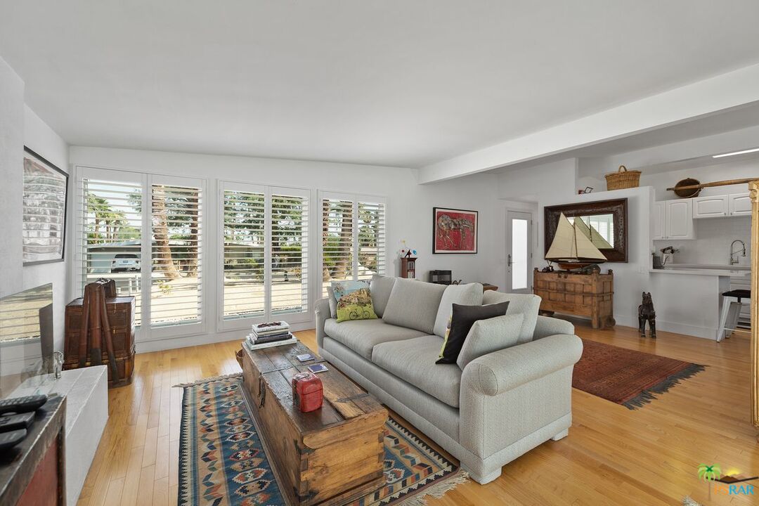 73501 Silver Moon Trail Palm Desert, CA 92260 - Photo 13 of 38 a living room with furniture and a large window
