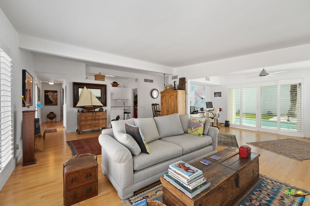 73501 Silver Moon Trail Palm Desert, CA 92260 - Photo 14 of 38 a living room with furniture and a rug