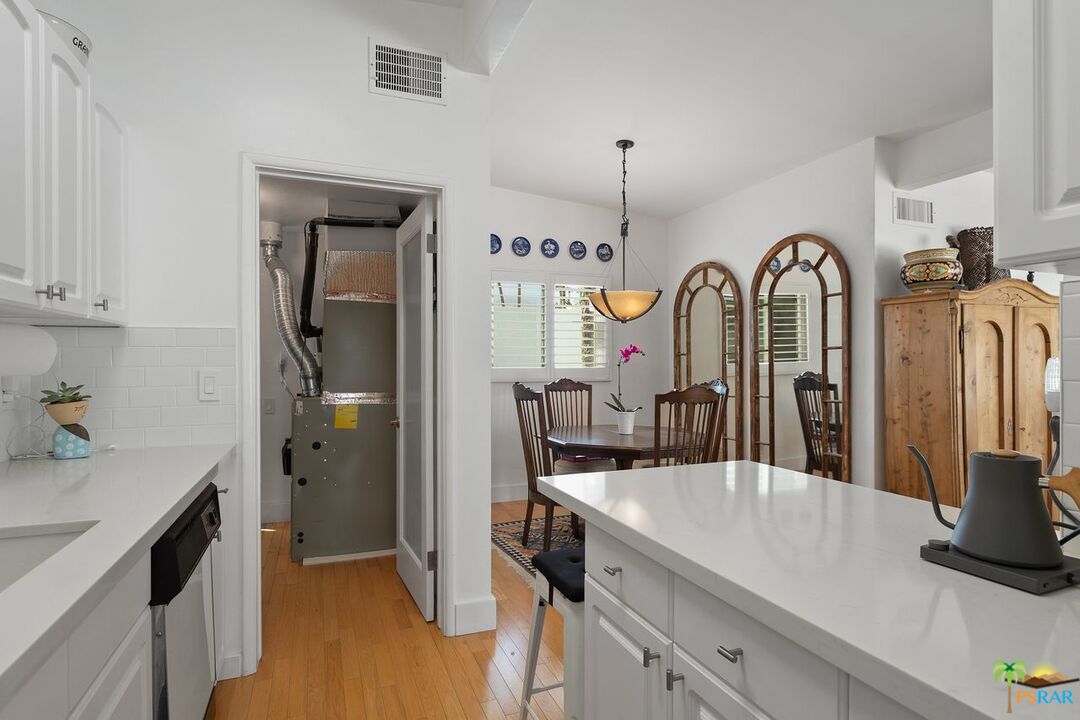 73501 Silver Moon Trail Palm Desert, CA 92260 - Photo 17 of 38 a view of living room with furniture and wooden floor