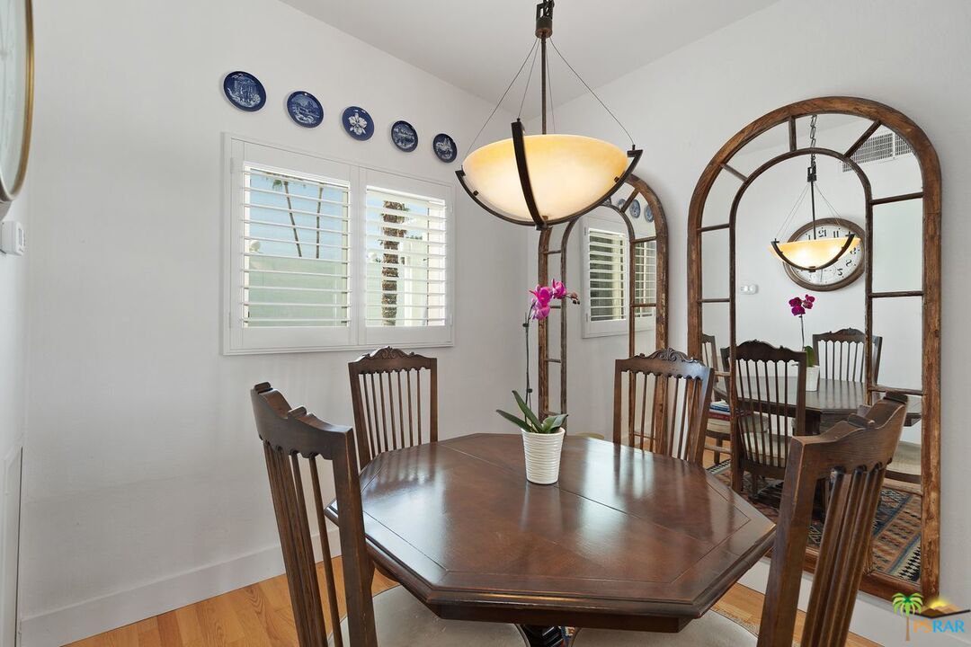 73501 Silver Moon Trail Palm Desert, CA 92260 - Photo 18 of 38 a view of dining room and hall with furniture