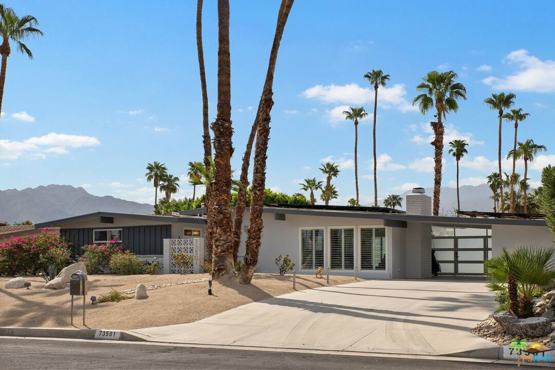 73501 Silver Moon Trail Palm Desert, CA 92260 - Photo 2 of 38 a view of a house with a porch and furniture