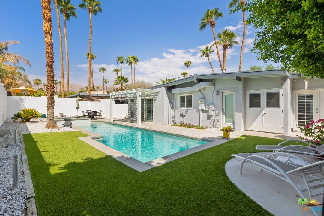 73501 Silver Moon Trail Palm Desert, CA 92260 - Photo 31 of 38 a view of a house with swimming pool