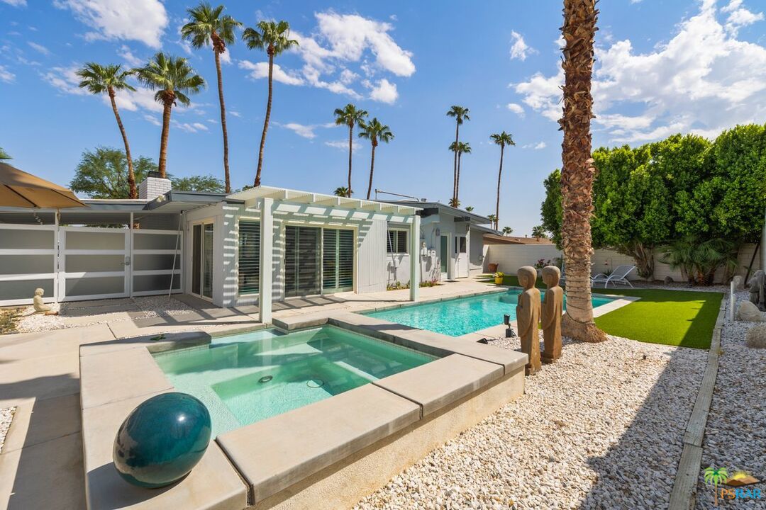 73501 Silver Moon Trail Palm Desert, CA 92260 - Photo 37 of 38 a view of a house with backyard and sitting area