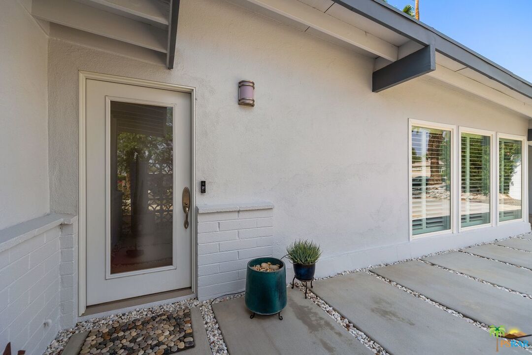 73501 Silver Moon Trail Palm Desert, CA 92260 - Photo 5 of 38 a view of a door and chair in the patio