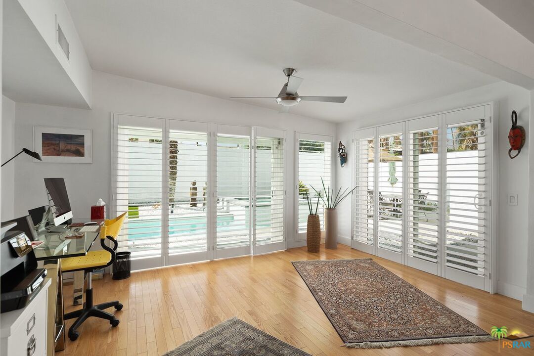 73501 Silver Moon Trail Palm Desert, CA 92260 - Photo 8 of 38 a view of a livingroom with workspace and a window