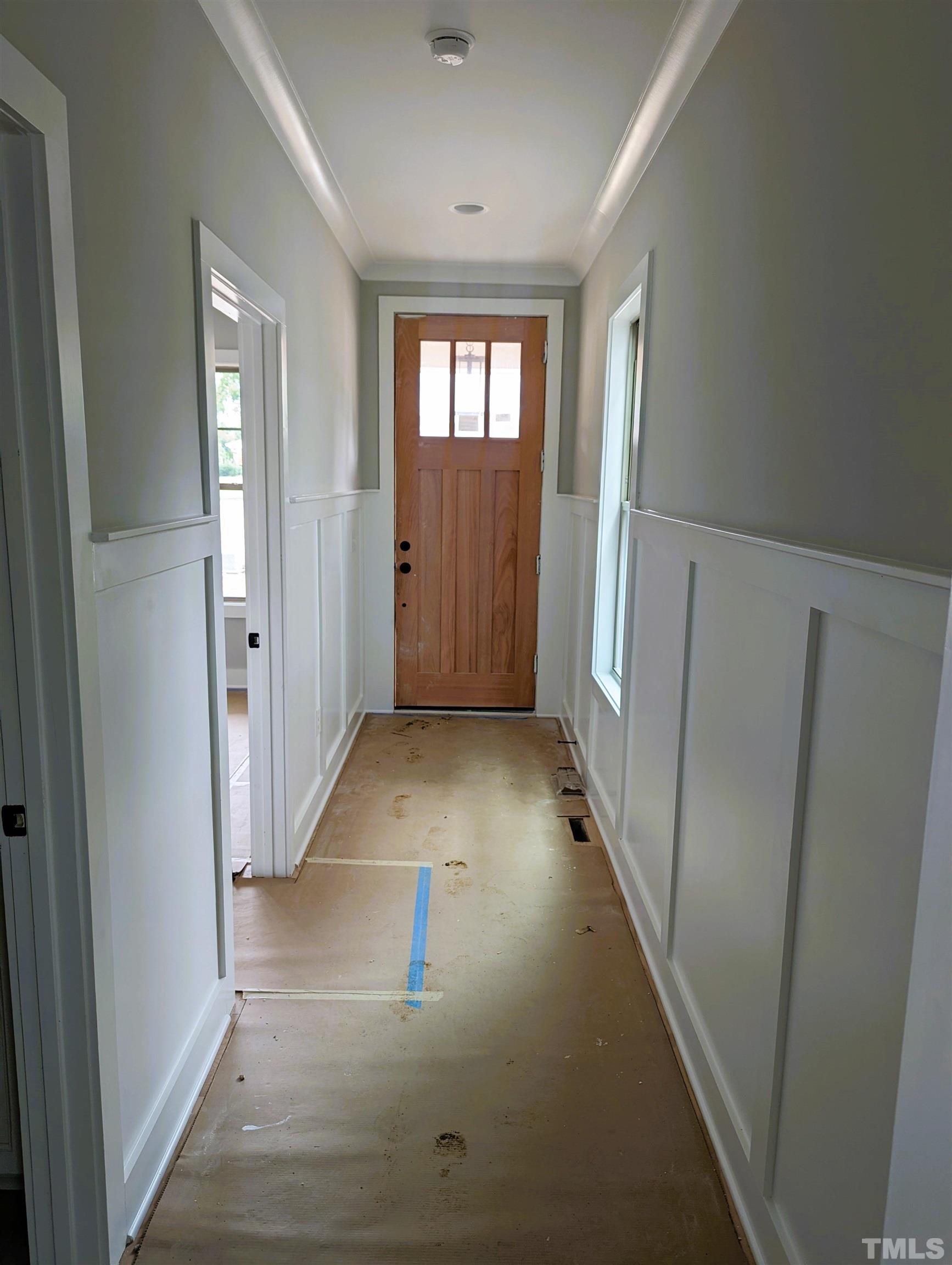 200 East Moore Street Apex, NC 27502 - Photo 4 of 19 a view of entryway with window and stairs