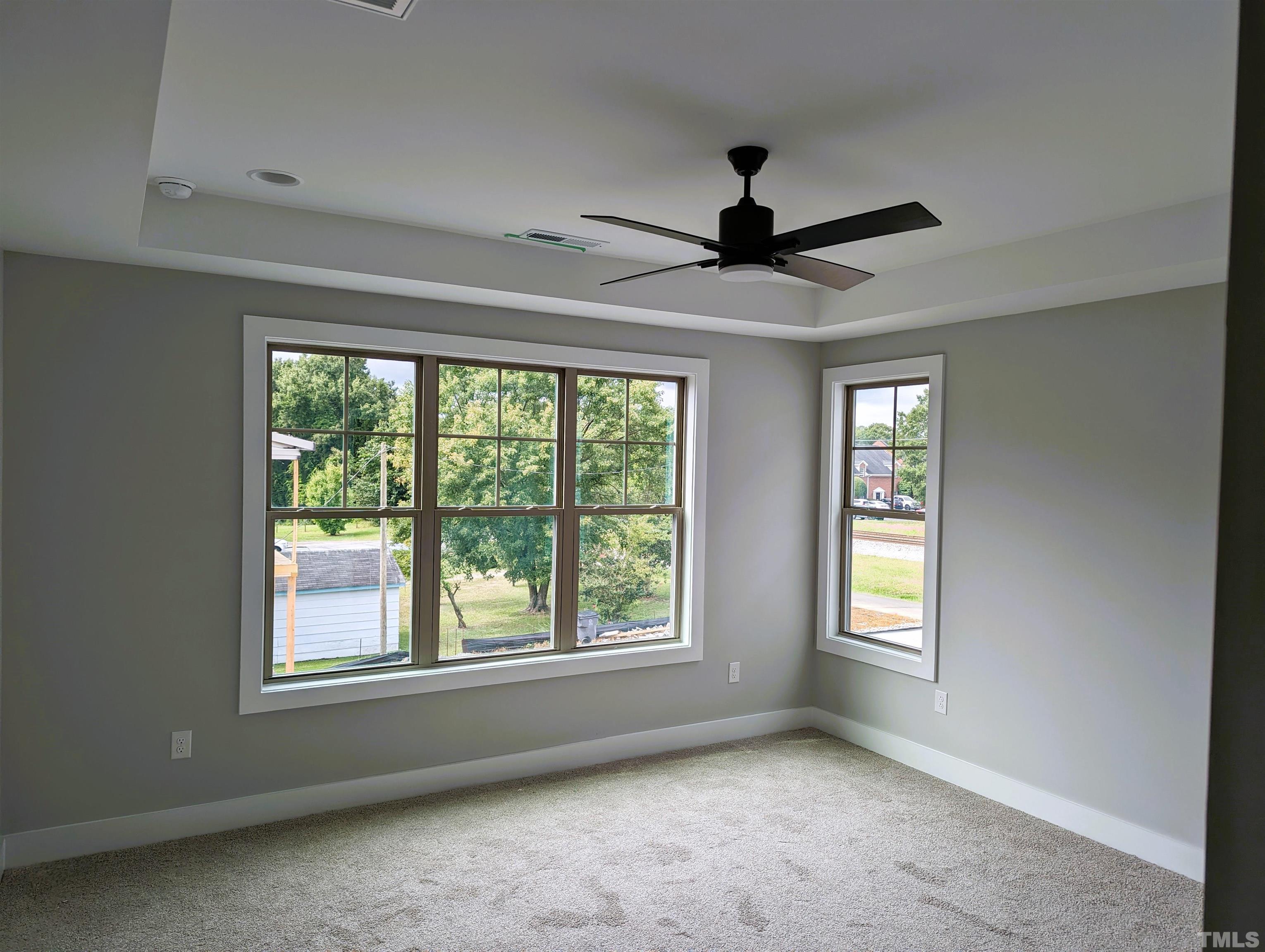 200 East Moore Street Apex, NC 27502 - Photo 6 of 19 a view of an empty room with a window