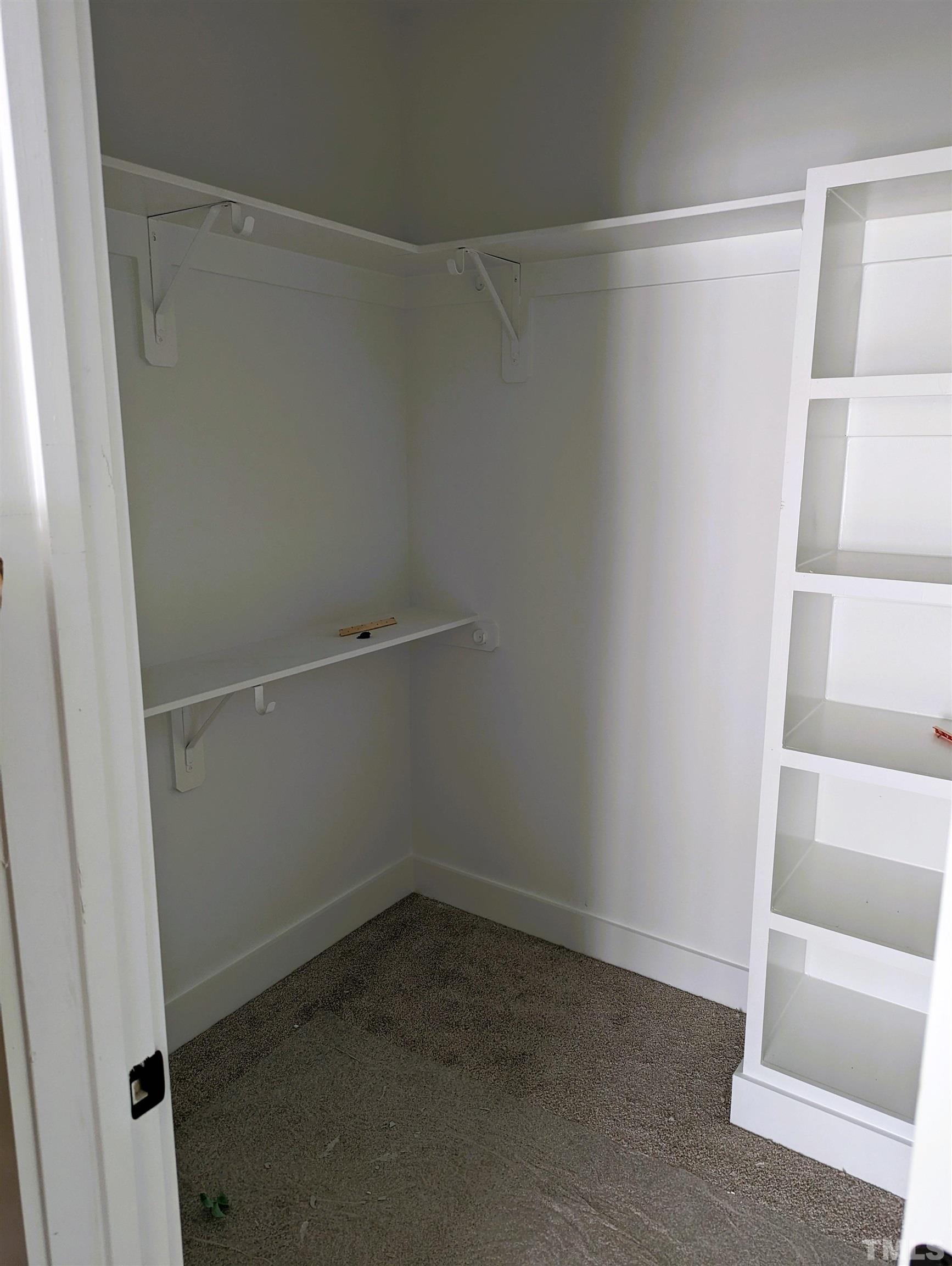 200 East Moore Street Apex, NC 27502 - Photo 8 of 19 a view of an empty walk in closet