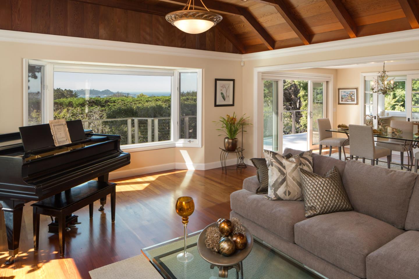 25840 Hatton Road Carmel, CA 93923 - Photo 11 of 43 a living room with furniture and a floor to ceiling window