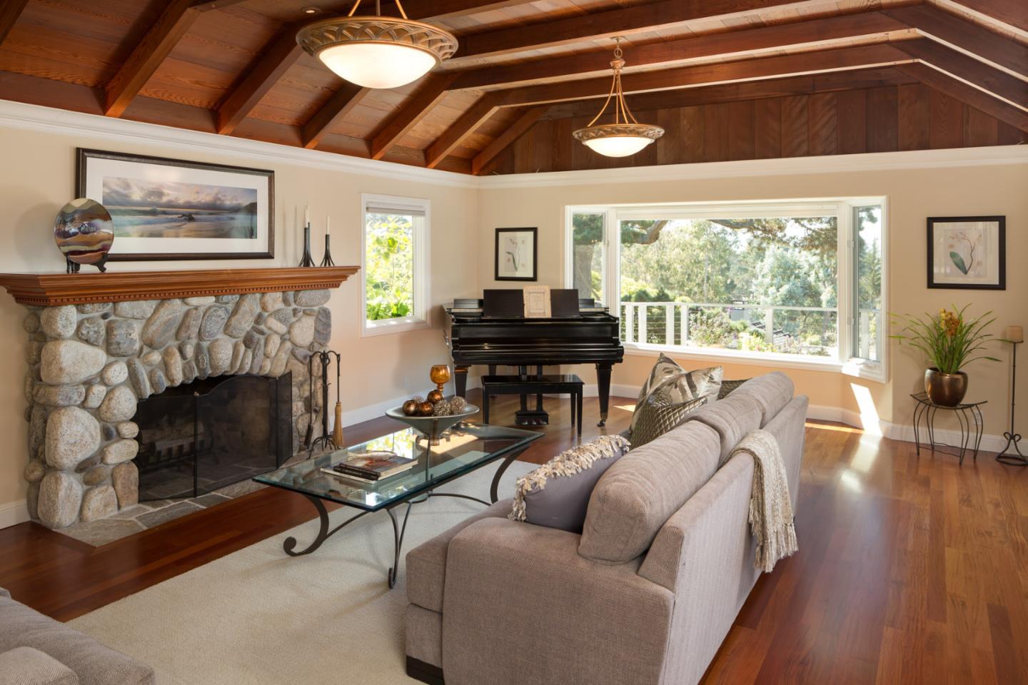 25840 Hatton Road Carmel, CA 93923 - Photo 12 of 43 a living room with furniture and a fireplace