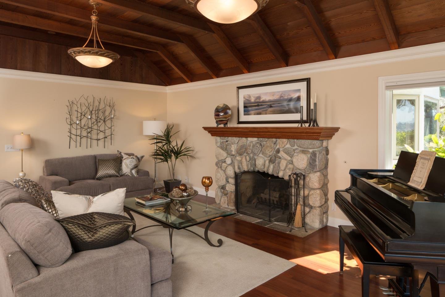 25840 Hatton Road Carmel, CA 93923 - Photo 13 of 43 a living room with furniture and a fireplace