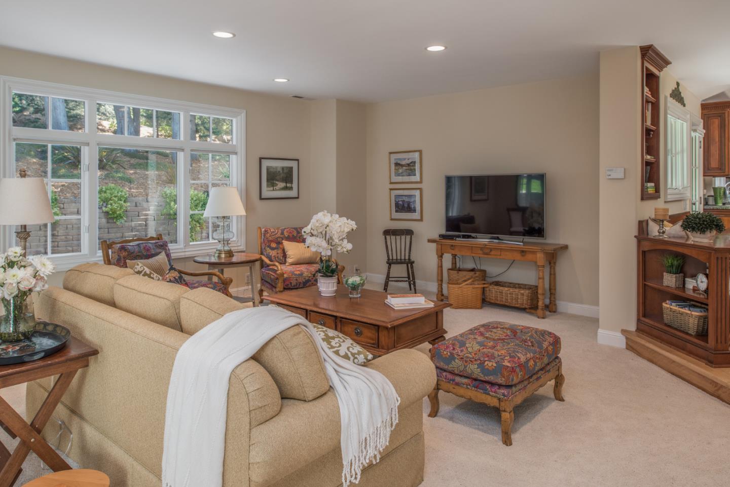 25840 Hatton Road Carmel, CA 93923 - Photo 22 of 43 a living room with furniture fireplace and flat screen tv