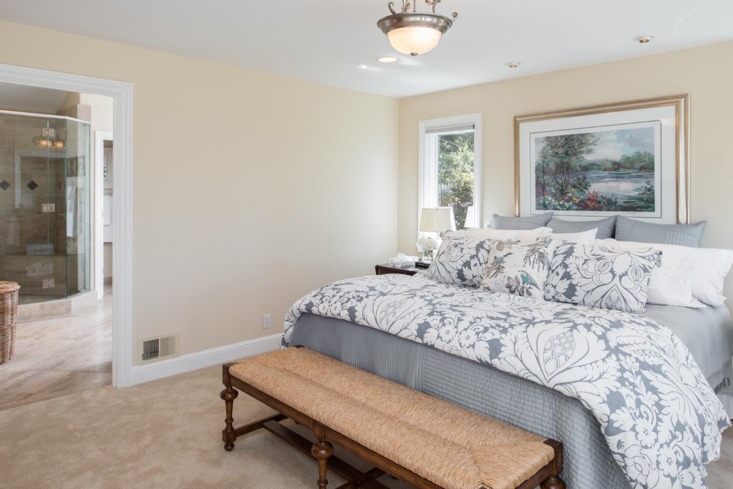 25840 Hatton Road Carmel, CA 93923 - Photo 25 of 43 a bedroom with a bed and window