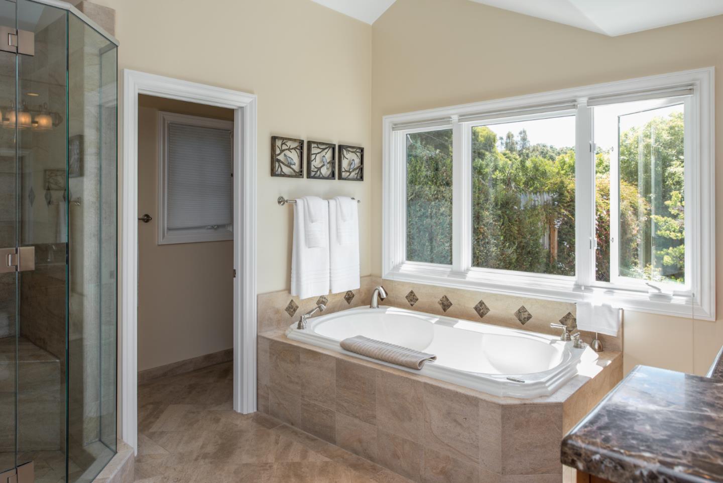 25840 Hatton Road Carmel, CA 93923 - Photo 26 of 43 a spacious bathroom with sink and shower