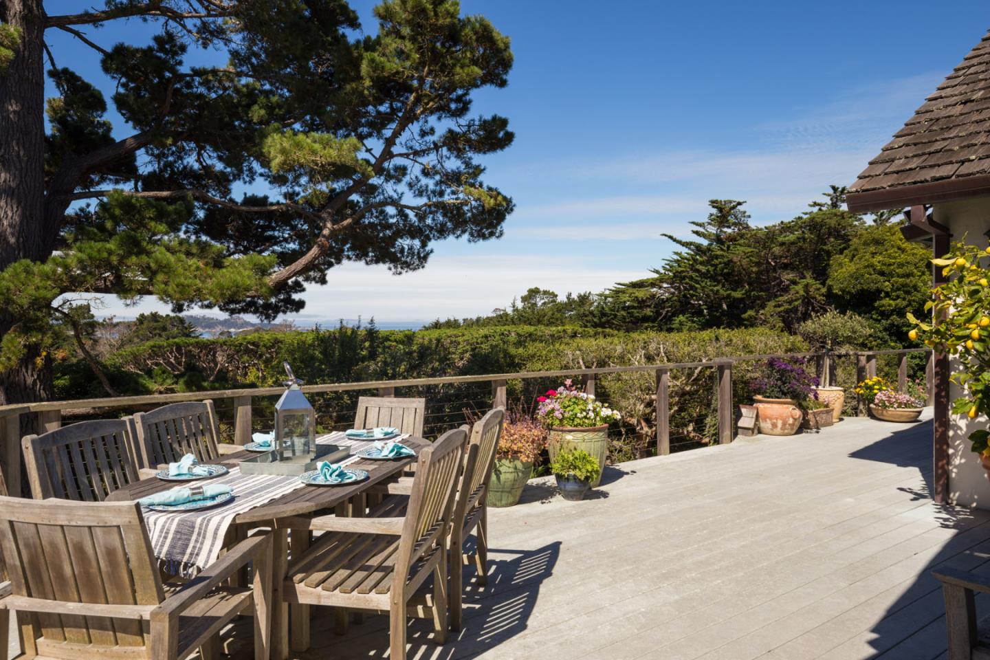 25840 Hatton Road Carmel, CA 93923 - Photo 3 of 43 a view of a patio with couches table and chairs and potted plants