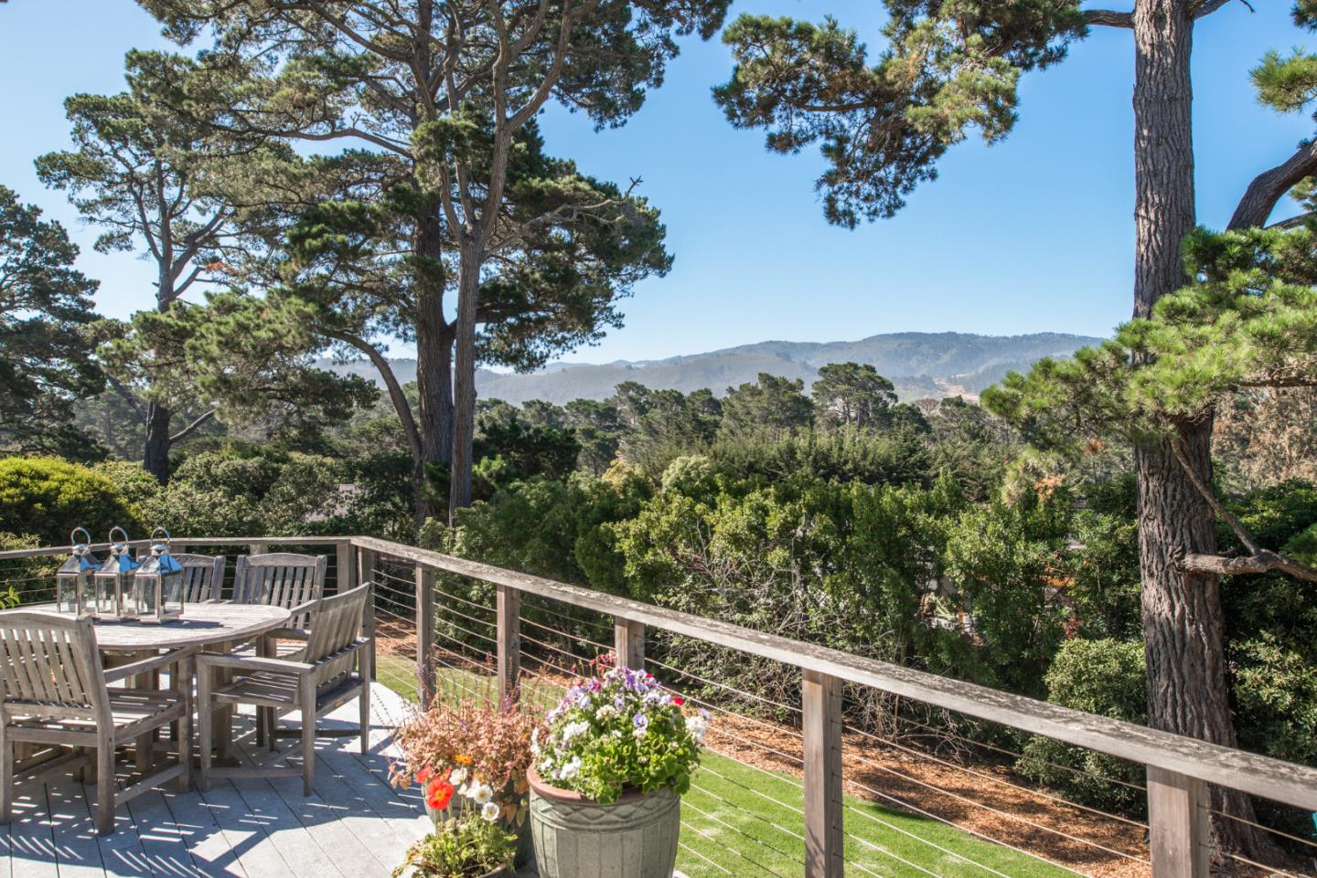 25840 Hatton Road Carmel, CA 93923 - Photo 4 of 43 a view of a balcony with wooden floor and fence