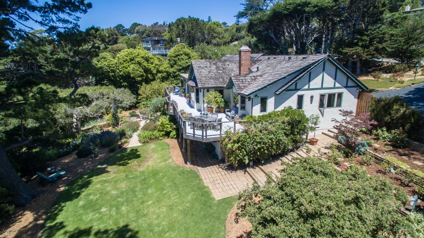 25840 Hatton Road Carmel, CA 93923 - Photo 41 of 43 a view of a house with a yard and garden