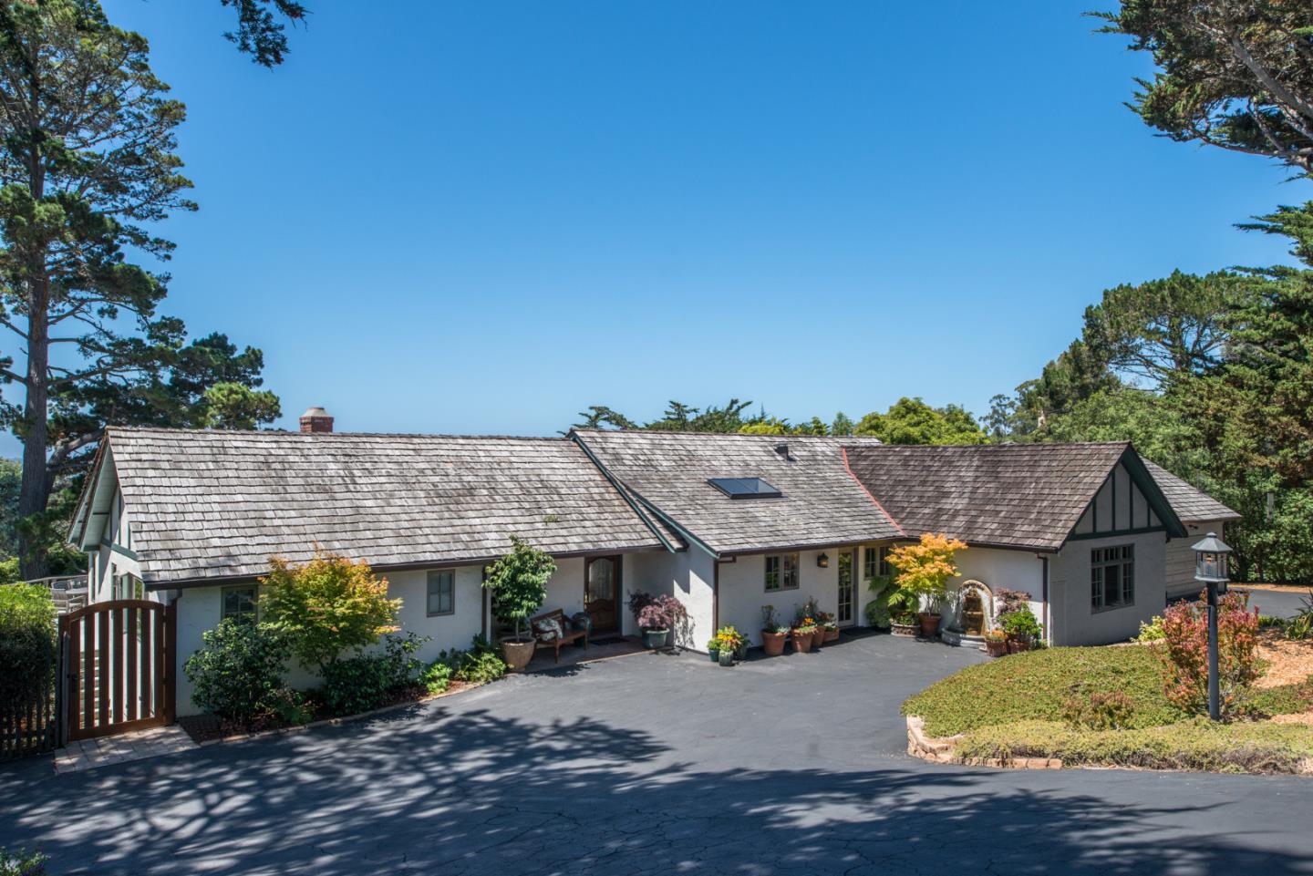 25840 Hatton Road Carmel, CA 93923 - Photo 9 of 43 front view of a house with a patio