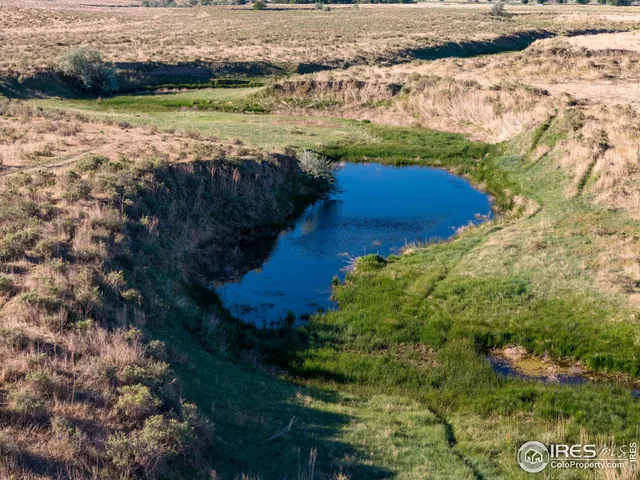 a view of a lake with outdoor space