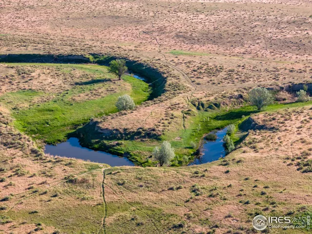a view of a pathway with a beach