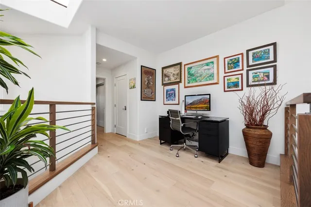 a bedroom with a bed and dresser