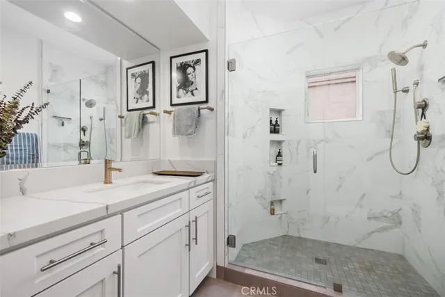 an outdoor space with furniture and umbrella