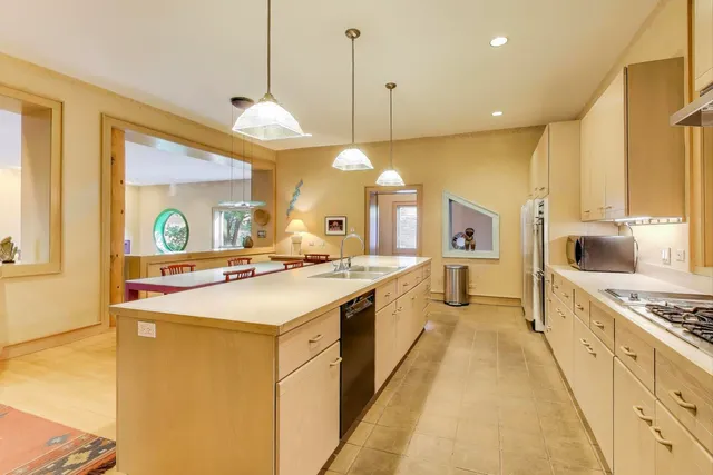 a bathroom with a sink and mirror